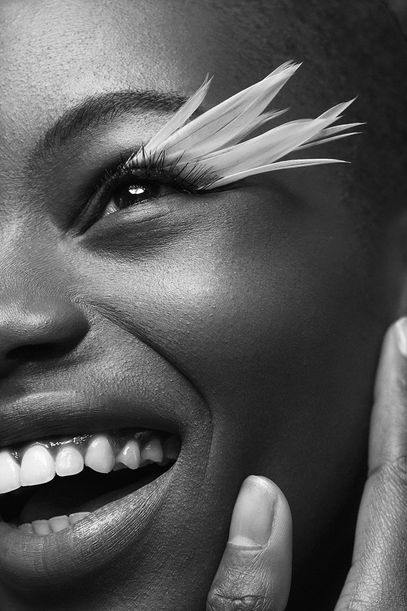 Fallen Angels series black and white close portrait with feather eyelashes