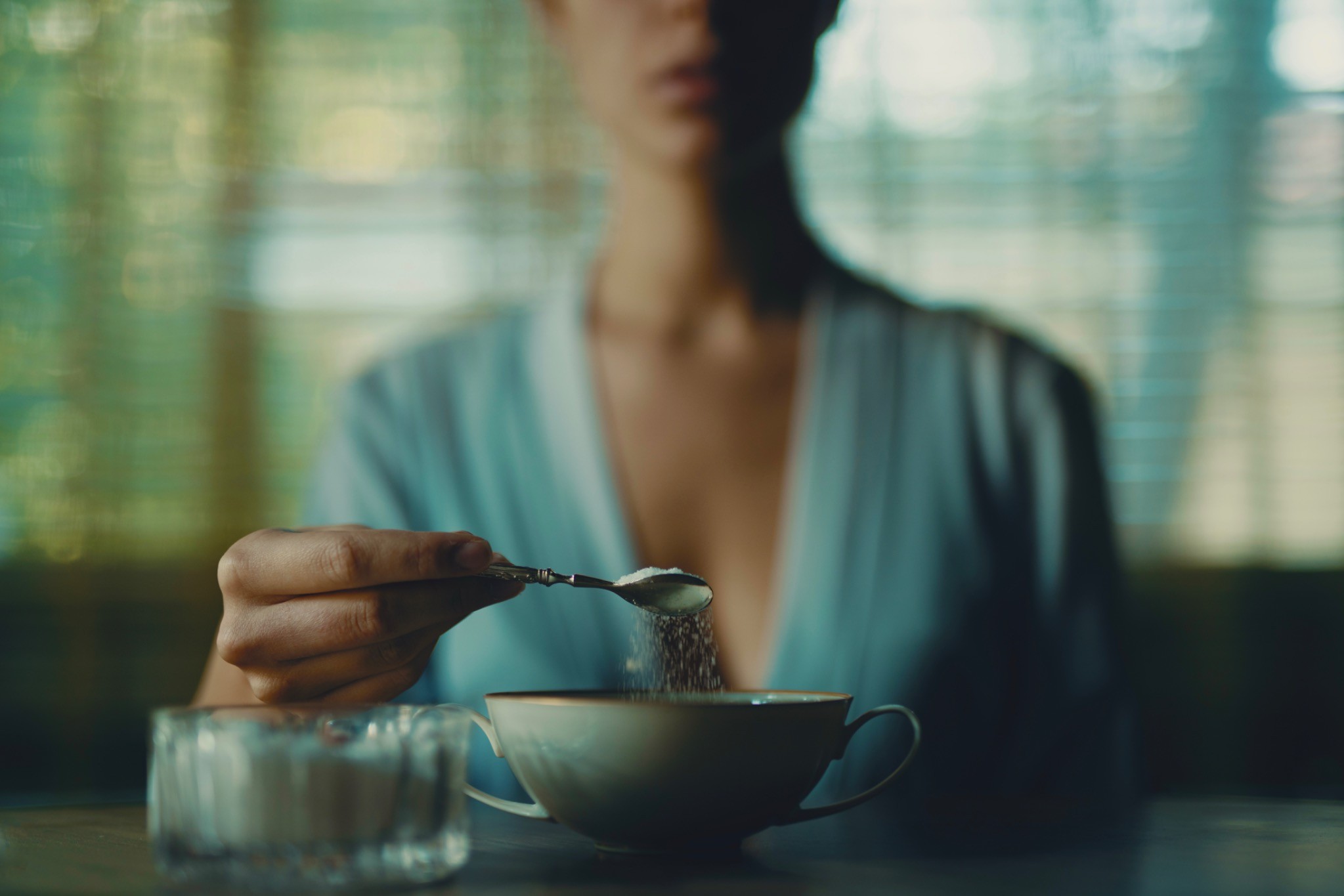 Morning Routine series detail of sugar falling into a cup