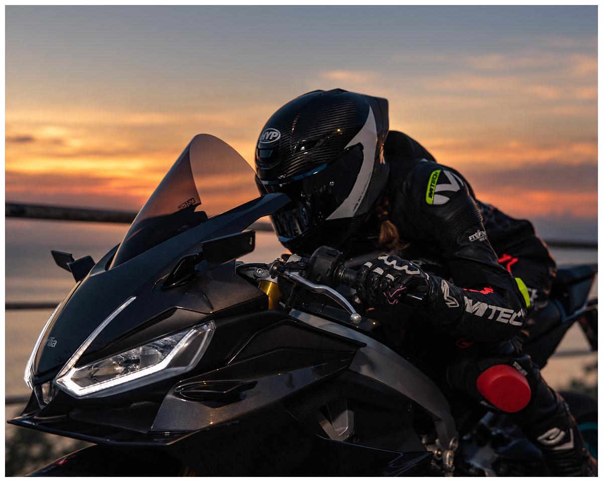 Rider and motorcycle at sunset