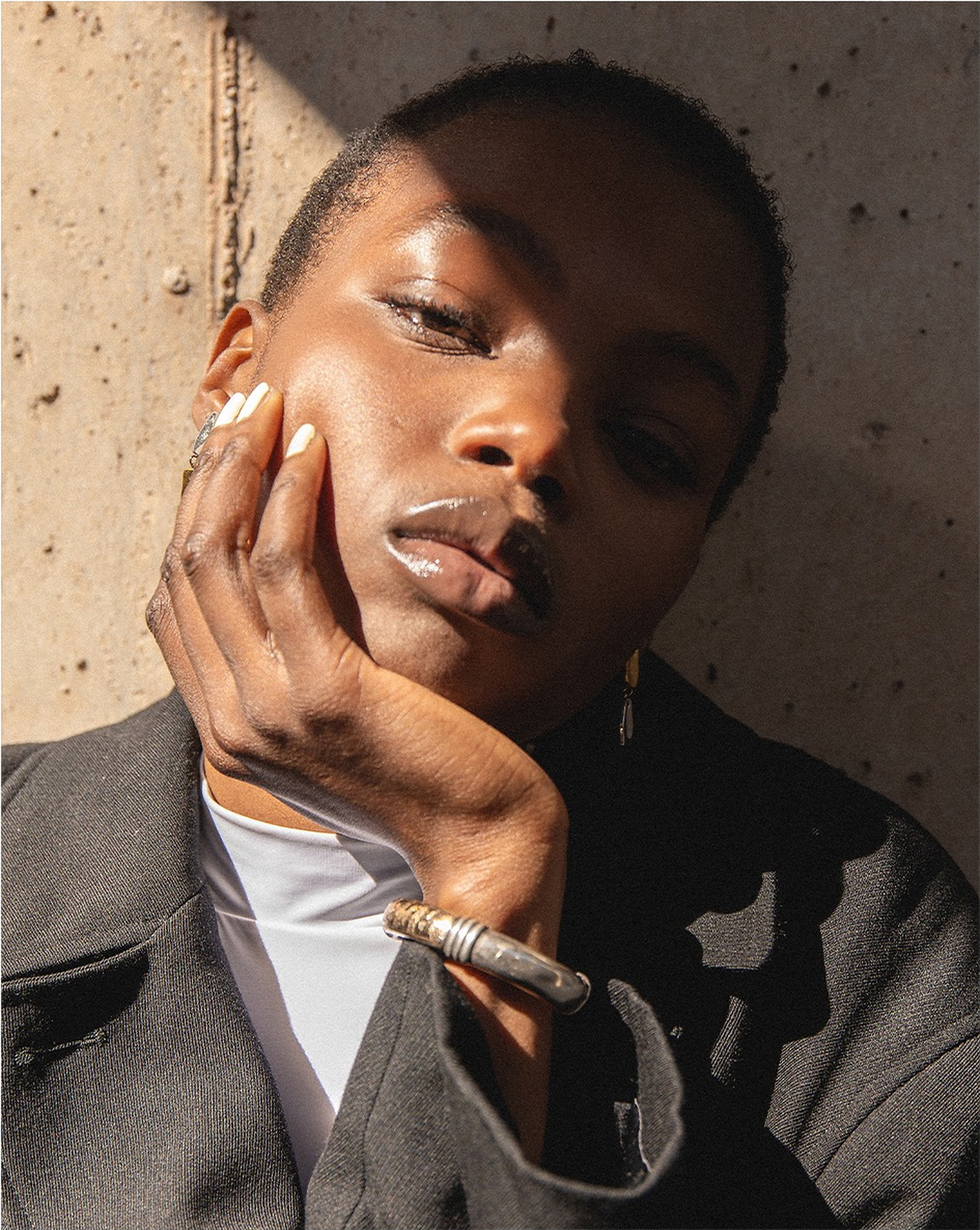 Fashion portrait in hard sunlight