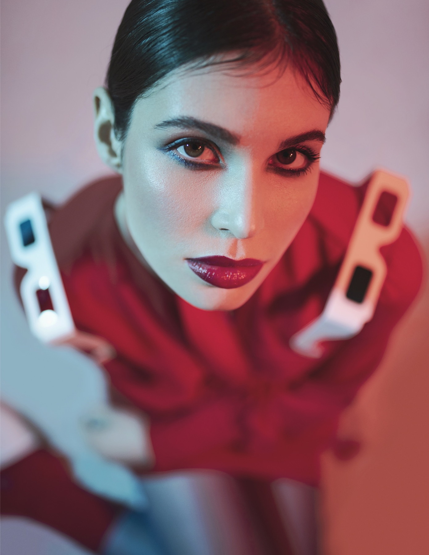 Editorial beauty portrait with red and blue light