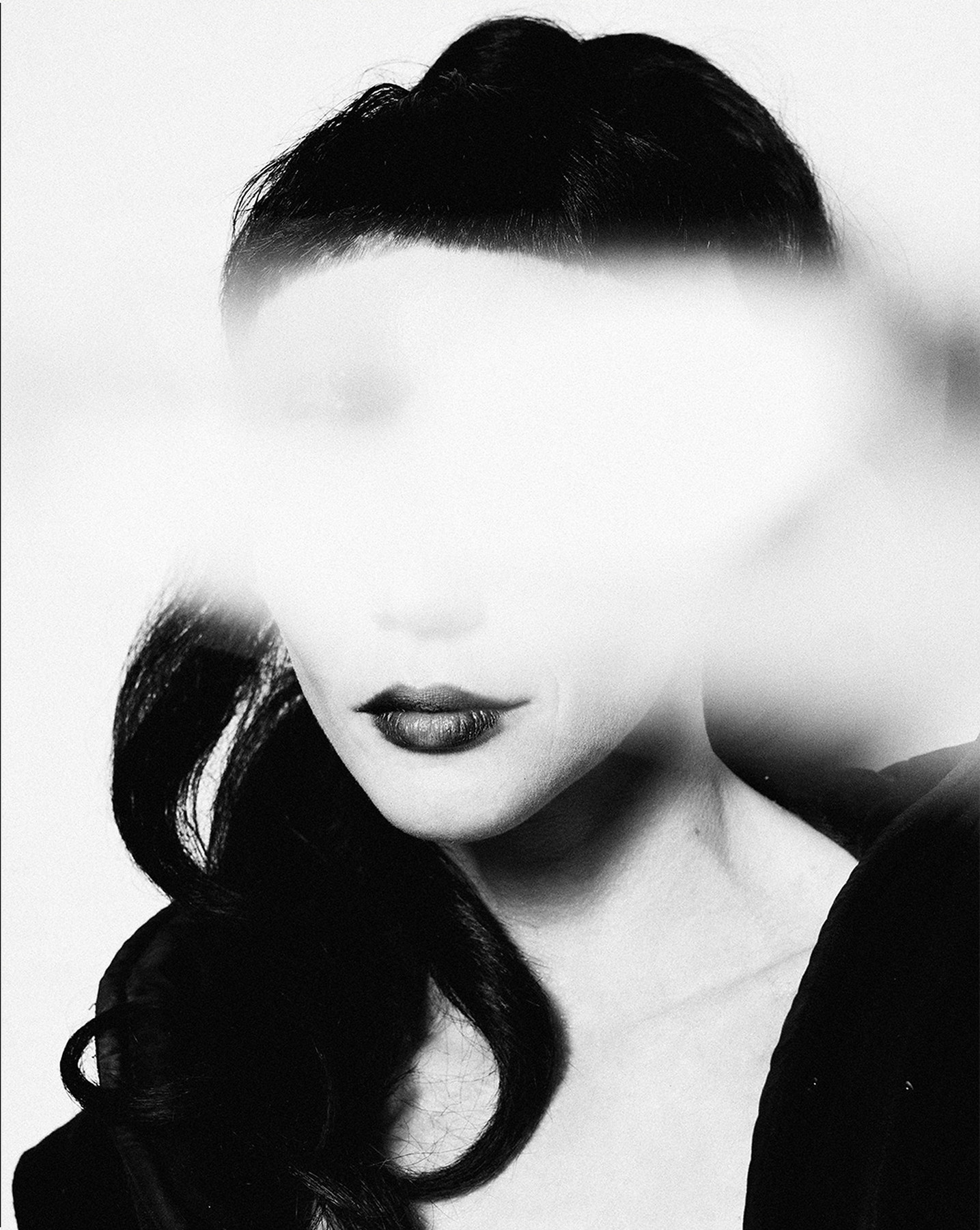 High-key black and white experimental portrait