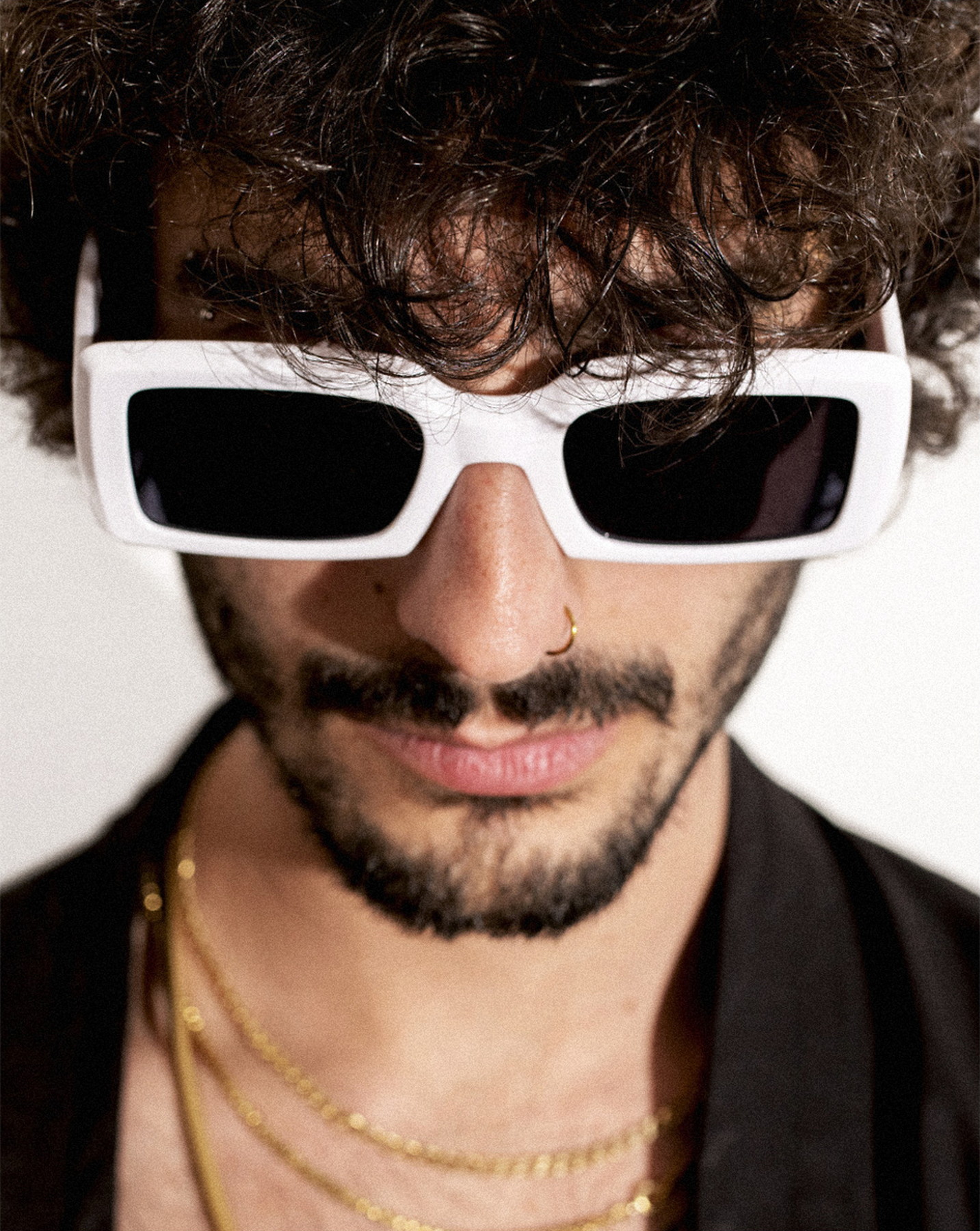 Male fashion portrait with white sunglasses