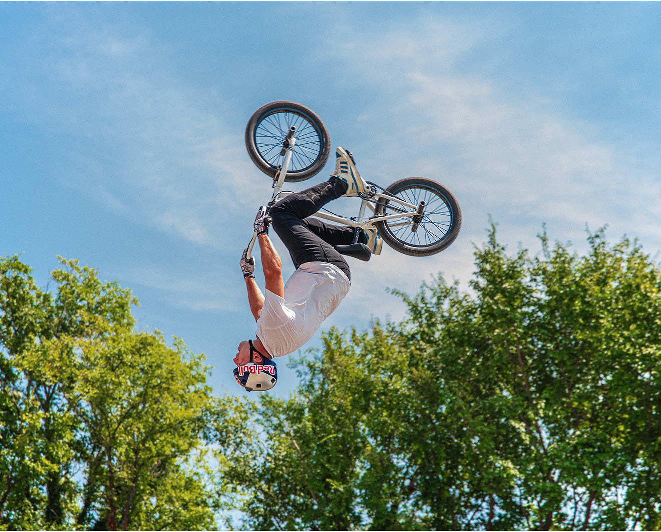 BMX rider rotating in the air