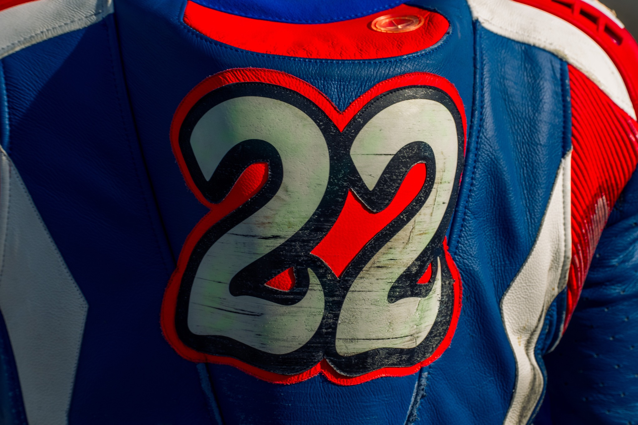 Close detail of a racing suit number